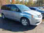 2013 Dodge Grand Caravan SE z VIN 2C4RDGBG0DR761234, wystawiony jako IAAI lot #43499936 z przebiegiem 98 750 mil mil oraz . Historia ofert i sprzedaży dostępna na DreamBid. Obrazek 1.