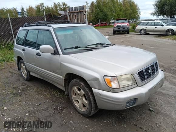2001 Subaru Forester S with VIN JF1SF65631H723339, listed as a Copart auction lot 69153995 with 180,657 mi miles and Salvage title. Bid and sale history available at DreamBid. Image 4.