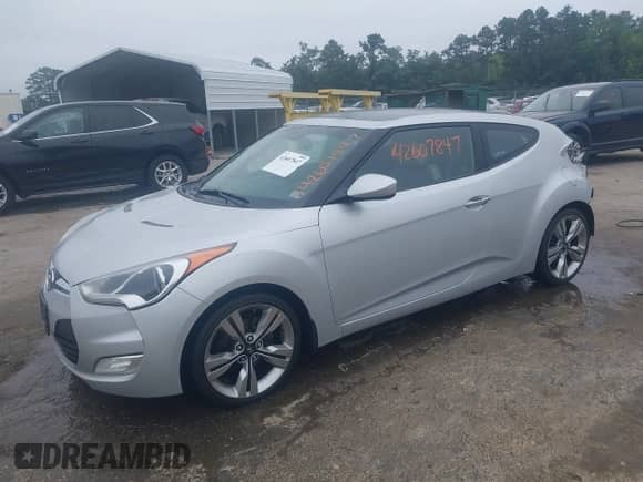2012 Hyundai Veloster w/Black Int с VIN KMHTC6AD1CU034787, выставлен на аукционе IAAI как лот 42607847 с пробегом 126 912 миль миль и . История ставок и продаж доступна на DreamBid. Изображение 18.