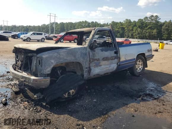 1997 Chevrolet Silverado 1500 z VIN 1GCEK14M4VZ166799, wystawiony jako Copart lot #69846415 z przebiegiem 195 832 mil mil oraz Szkoda całkowita • Salvage title. Historia ofert i sprzedaży dostępna na DreamBid. Obrazek 1.