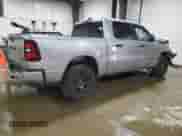 2025 Ram 1500 Tradesman with VIN 1C6RRFGG9SN681811, listed as a Copart auction lot 55799005 with 1,133 mi miles and Salvage title. Bid and sale history available at DreamBid. Image 3.