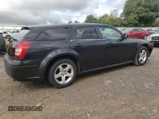 2007 Dodge Magnum with VIN 2D4FV47T77H739135, listed as a Copart auction lot 72145074 with 203,623 mi miles and Salvage title. Bid and sale history available at DreamBid. Image 3.