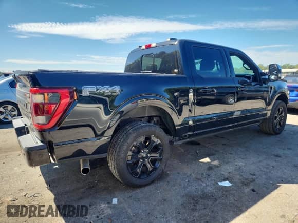 2022 Ford F-150 XLT with VIN 1FTFW1ED3NFB08580, listed as a Copart auction lot 84300815 with 67,768 mi miles and Salvage title. Bid and sale history available at DreamBid. Image 3.