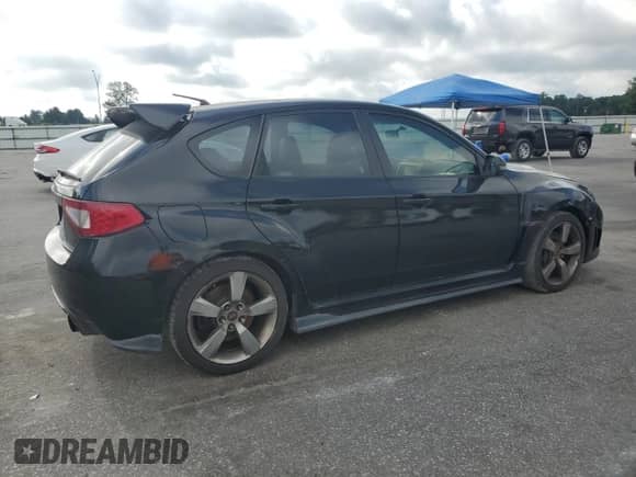 2009 Subaru WRX STI with VIN JF1GR89619L800933, listed as a Copart auction lot 63035745 with 137,004 mi miles and Clean title. Bid and sale history available at DreamBid. Image 3.