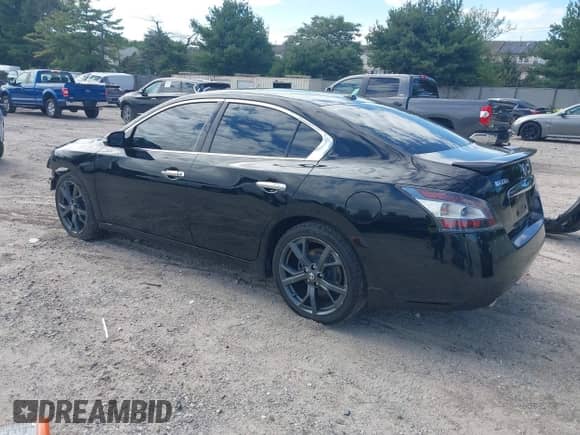 2014 Nissan Maxima S z VIN 1N4AA5AP5EC446974, wystawiony jako IAAI lot #42992248 z przebiegiem 146 715 mil mil oraz . Historia ofert i sprzedaży dostępna na DreamBid. Obrazek 3.