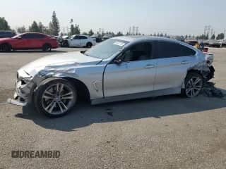 2017 BMW 4 Series 440i with VIN WBA4E3C52HG187320, listed as a Copart auction lot 68322725 with 103,034 mi miles and Salvage title. Bid and sale history available at DreamBid. Image 1.