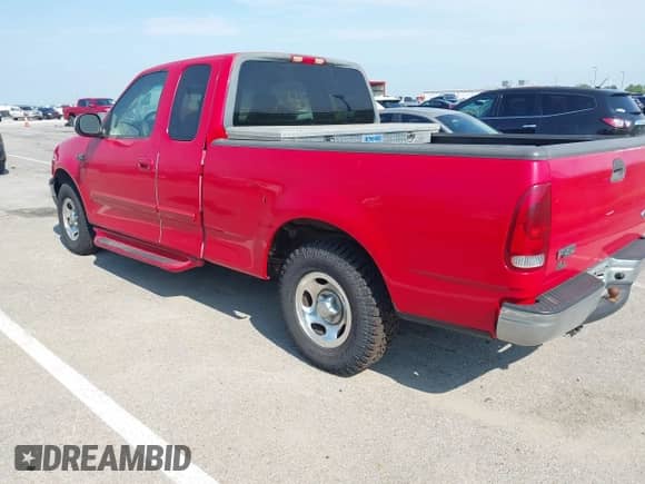 2001 Ford F-150 XL z VIN 1FTZX17231NB75203, wystawiony jako IAAI lot #42961897 z przebiegiem 159 646 mil mil oraz . Historia ofert i sprzedaży dostępna na DreamBid. Obrazek 3.