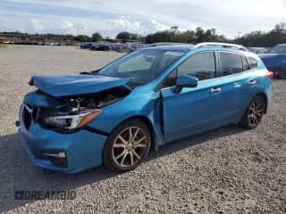 2017 Subaru Impreza Limited with VIN 4S3GTAT66H3702572, listed as a Copart auction lot 70713195 with 98,972 mi miles and Salvage title. Bid and sale history available at DreamBid. Image 1.