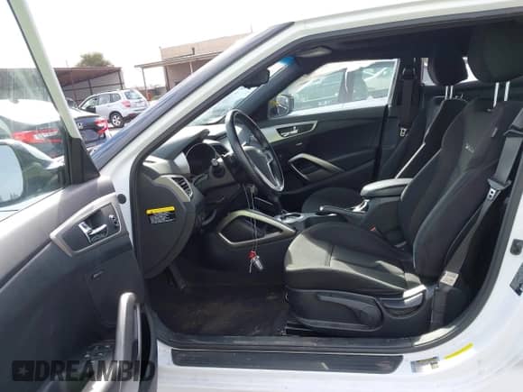 2017 Hyundai Veloster with VIN KMHTC6ADXHU318331, listed as a IAAI auction lot 41588356 with 48,282 mi miles and . Bid and sale history available at DreamBid. Image 5.