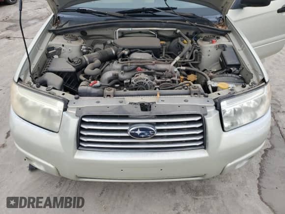 2007 Subaru Forester X with VIN JF1SG636X7G725541, listed as a Copart auction lot 51869335 with 242,623 mi miles and Clean title. Bid and sale history available at DreamBid. Image 12.