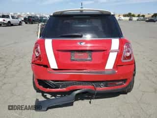 2011 MINI Hardtop S with VIN WMWSV3C50BTY12562, listed as a Copart auction lot 61183425 with 125,126 mi miles and Salvage title. Bid and sale history available at DreamBid. Image 6.