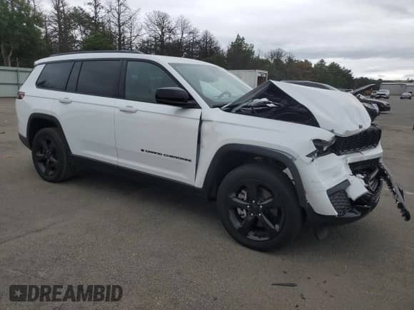 2024 Jeep Grand Cherokee Altitude X with VIN 1C4RJKAGXR8584093, listed as a Copart auction lot 69179305 with 8,704 mi miles and Salvage title. Bid and sale history available at DreamBid. Image 4.