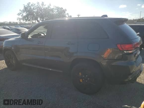 2020 Jeep Grand Cherokee Trackhawk с VIN 1C4RJFN9XLC407356, выставлен на аукционе Copart как лот 80822934 с пробегом 10 072 миль миль и На запчасти • Non repairable. История ставок и продаж доступна на DreamBid. Изображение 2.