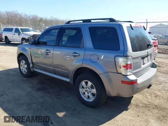 2008 Mercury Mariner with VIN 4M2CU91148KJ50412, listed as a IAAI auction lot 41715972 with 130,426 mi miles and . Bid and sale history available at DreamBid. Image 3.