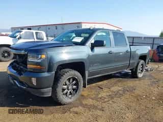 2017 Chevrolet Silverado 1500 LT z VIN 1GCUKREC6HF234350, wystawiony jako IAAI lot #43260593 z przebiegiem 101 312 mil mil oraz . Historia ofert i sprzedaży dostępna na DreamBid. Obrazek 2.