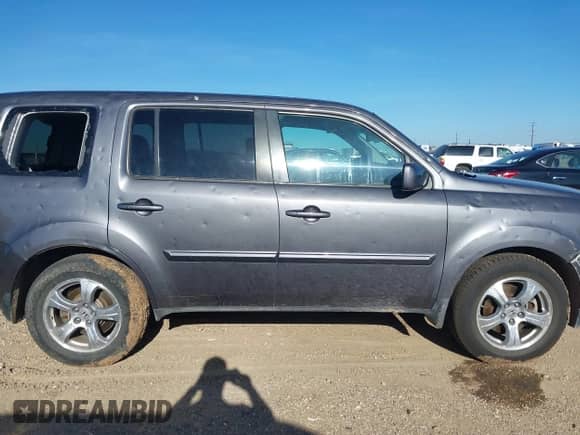 2014 Honda Pilot EX-L z VIN 5FNYF4H58EB012480, wystawiony jako IAAI lot #42845876 z przebiegiem 131 996 mil mil oraz . Historia ofert i sprzedaży dostępna na DreamBid. Obrazek 13.
