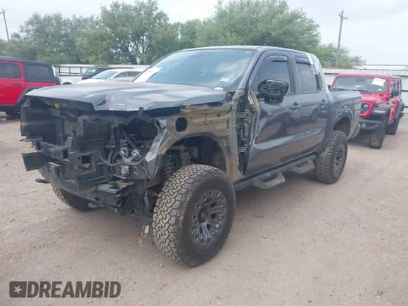 2022 Nissan Frontier SV with VIN 1N6ED1EK4NN650046, listed as a IAAI auction lot 41940072 with 48,967 mi miles and . Bid and sale history available at DreamBid. Image 2.