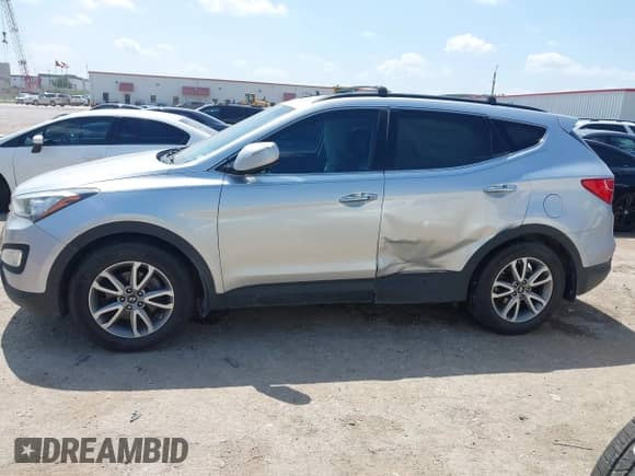 2016 Hyundai Santa Fe with VIN 5XYZU3LA2GG325786, listed as a IAAI auction lot 42515766 with 214,896 mi miles and . Bid and sale history available at DreamBid. Image 14.