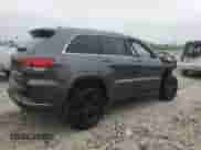 2016 Jeep Grand Cherokee Overland z VIN 1C4RJFCG7GC375652, wystawiony jako Copart lot #57436385 z przebiegiem 140 909 mil mil oraz Czysty tytuł • Clean title. Historia ofert i sprzedaży dostępna na DreamBid. Obrazek 3.