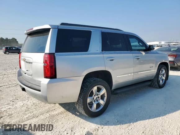 2015 Chevrolet Tahoe LS с VIN 1GNSCAKC5FR308869, выставлен на аукционе Copart как лот 72003065 с пробегом 116 502 миль миль и Списание • Salvage title. История ставок и продаж доступна на DreamBid. Изображение 3.