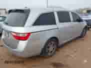 2013 Honda Odyssey EX-L with VIN 5FNRL5H64DB020229, listed as a IAAI auction lot 43119656 with 149,509 mi miles and . Bid and sale history available at DreamBid. Image 4.