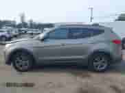 2014 Hyundai Santa Fe z VIN 5XYZUDLB3EG228902, wystawiony jako IAAI lot #43337015 z przebiegiem 109 402 mil mil oraz . Historia ofert i sprzedaży dostępna na DreamBid. Obrazek 14.