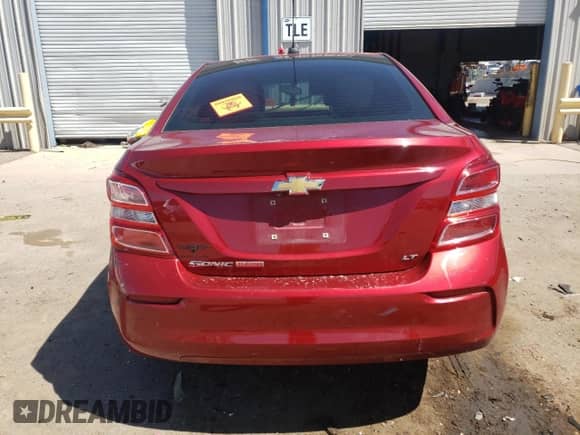 2018 Chevrolet Sonic LT with VIN 1G1JD5SB3J4139708, listed as a Copart auction lot 53909265 with 128,103 mi miles and Salvage title. Bid and sale history available at DreamBid. Image 6.
