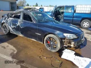 2012 BMW 7 Series 750i with VIN WBAKA8C55CCY37886, listed as a IAAI auction lot 42050003 with 86,722 mi miles and . Bid and sale history available at DreamBid. Image 1.