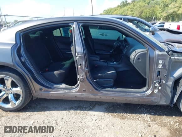 2014 Dodge Charger SE with VIN 2C3CDXBG2EH364318, listed as a IAAI auction lot 43365253 with 105,597 mi miles and . Bid and sale history available at DreamBid. Image 14.