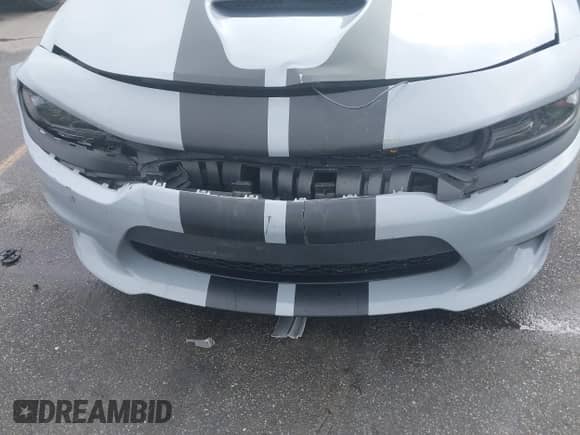 2021 Dodge Charger Scat Pack Widebody z VIN 2C3CDXGJ4MH518627, wystawiony jako IAAI lot #43337400 z przebiegiem 33 164 mil mil oraz . Historia ofert i sprzedaży dostępna na DreamBid. Obrazek 6.