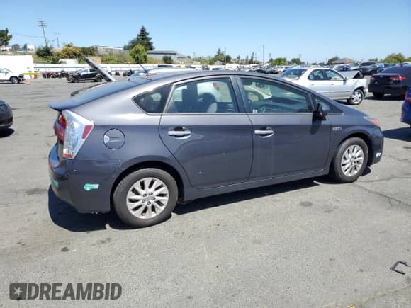 2015 Toyota Prius Advanced z VIN JTDKN3DP0F3073296, wystawiony jako Copart lot #66462785 z przebiegiem 219 721 mil mil oraz Czysty tytuł • Clean title. Historia ofert i sprzedaży dostępna na DreamBid. Obrazek 3.