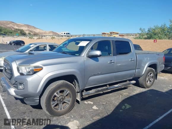 2017 Toyota Tacoma SR5 with VIN 3TMBZ5DNXHM006608, listed as a IAAI auction lot 43412044 with 114,937 mi miles and . Bid and sale history available at DreamBid. Image 14.