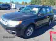 2011 Subaru Forester X with VIN JF2SHABC5BH779626, listed as a IAAI auction lot 43451622 with 155,167 mi miles and . Bid and sale history available at DreamBid. Image 2.