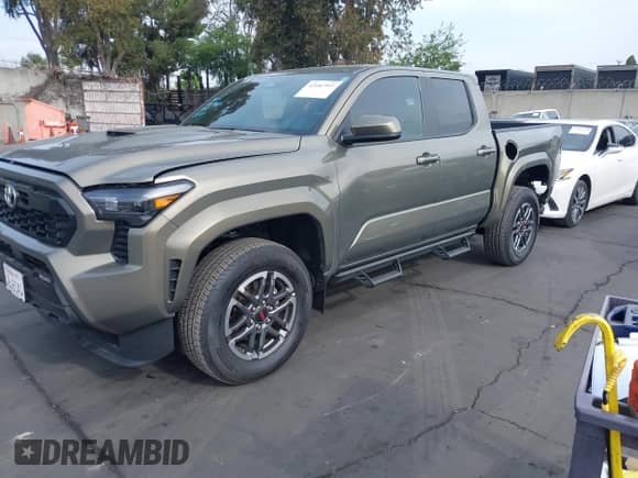 2024 Toyota Tacoma SR5 with VIN 3TMLB5JN1RM043397, listed as a IAAI auction lot 42181997 with 9,254 mi miles and . Bid and sale history available at DreamBid. Image 20.
