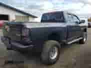 2013 Ram 1500 Express z VIN 1C6RR7FT9DS703511, wystawiony jako Copart lot #87063005 z przebiegiem 189 998 mil mil oraz Czysty tytuł • Clean title. Historia ofert i sprzedaży dostępna na DreamBid. Obrazek 3.