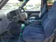 1999 Chevrolet Suburban с VIN 1GNGK26JXXJ384868, выставлен на аукционе Copart как лот 63163395 с пробегом 89 794 миль миль и Списание • Salvage title. История ставок и продаж доступна на DreamBid. Изображение 7.