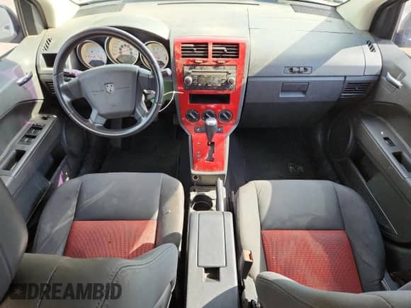 2009 Dodge Caliber R/T z VIN 1B3HB78B19D224302, wystawiony jako Copart lot #85001825 z przebiegiem 208 982 mil mil oraz Szkoda całkowita • Salvage title. Historia ofert i sprzedaży dostępna na DreamBid. Obrazek 8.