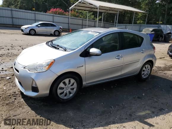 2012 Toyota Prius Four z VIN JTDKDTB36C1507960, wystawiony jako Copart lot #71008385 z przebiegiem 154 493 mil mil oraz Szkoda całkowita • Salvage title. Historia ofert i sprzedaży dostępna na DreamBid. Obrazek 1.