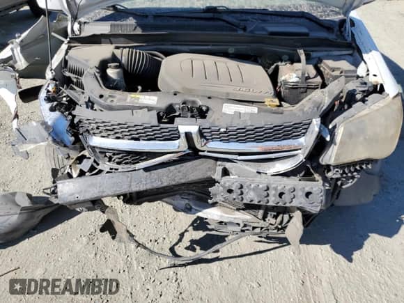 2014 Dodge Grand Caravan SXT z VIN 2C4RDGCG8ER289252, wystawiony jako Copart lot #80755915 z przebiegiem Nie podano mil oraz Szkoda całkowita • Salvage title. Historia ofert i sprzedaży dostępna na DreamBid. Obrazek 12.