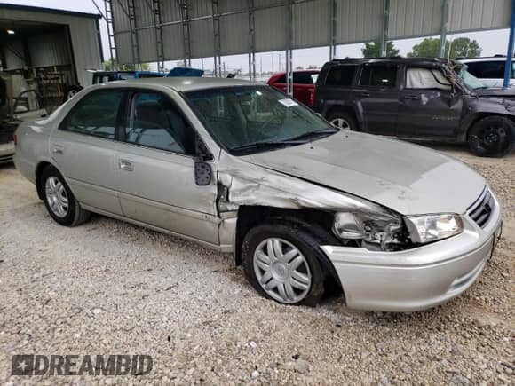2000 Toyota Camry LE с VIN 4T1BF22K0YU099470, выставлен на аукционе Copart как лот 70028715 с пробегом 238 736 миль миль и Списание • Salvage title. История ставок и продаж доступна на DreamBid. Изображение 4.
