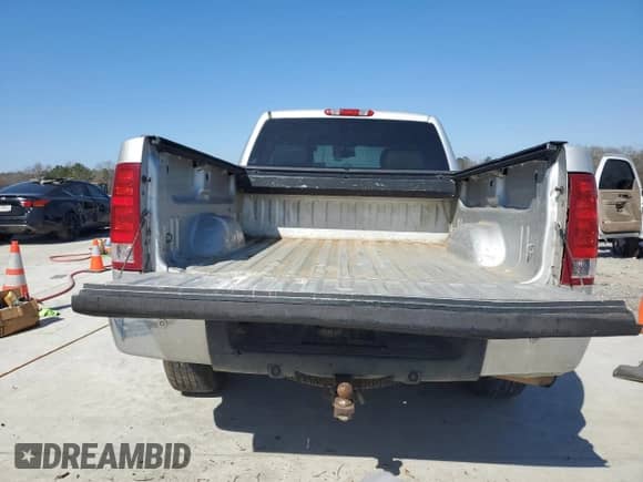 2010 GMC Sierra 1500 with VIN 1GTSCWE04AZ221013, listed as a Copart auction lot 46502985 with 232,338 mi miles and Salvage title. Bid and sale history available at DreamBid. Image 6.