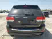 2015 Jeep Grand Cherokee High Altitude with VIN 1C4RJECGXFC906464, listed as a Copart auction lot 49657955 with 125,239 mi miles and Salvage title. Bid and sale history available at DreamBid. Image 6.