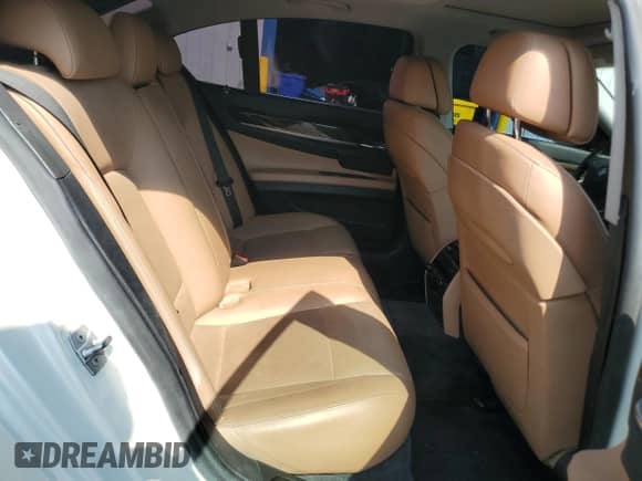 2010 BMW 7 Series 750i z VIN WBAKA8C51ACY36036, wystawiony jako Copart lot #67574805 z przebiegiem 85 113 mil mil oraz Czysty tytuł • Clean title. Historia ofert i sprzedaży dostępna na DreamBid. Obrazek 10.