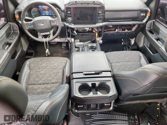 2023 Ford F-150 XL with VIN 1FTEW1E83PFB44870, listed as a Copart auction lot 67404595 with 69,006 mi miles and Salvage title. Bid and sale history available at DreamBid. Image 8.