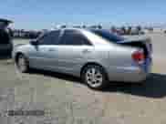 2005 Toyota Camry LE with VIN 4T1BF32K05U603632, listed as a Copart auction lot 84240185 with 181,404 mi miles and Salvage title. Bid and sale history available at DreamBid. Image 2.