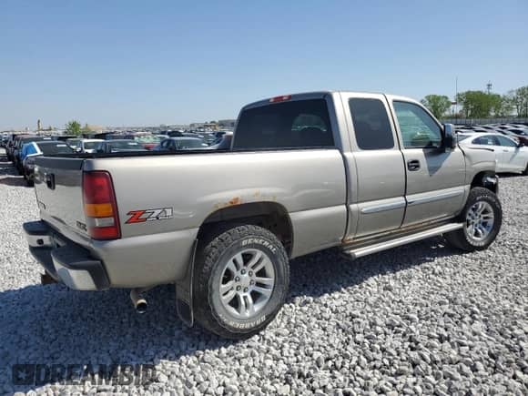 2003 GMC Sierra 1500 SLE with VIN 2GTEK19T731146665, listed as a Copart auction lot 69531743 with 119,687 mi miles and Salvage title. Bid and sale history available at DreamBid. Image 3.