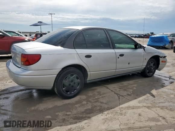 2002 Saturn SL with VIN 1G8ZH52892Z242469, listed as a Copart auction lot 59973755 with Not provided miles and Salvage title. Bid and sale history available at DreamBid. Image 3.
