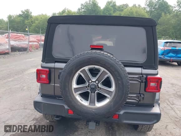 2021 Jeep Wrangler Unlimited Sahara Altitude with VIN 1C4HJXEG7MW776529, listed as a IAAI auction lot 42911866 with 51,748 mi miles and . Bid and sale history available at DreamBid. Image 16.