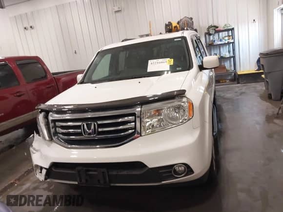 2014 Honda Pilot EX-L with VIN 5FNYF4H5XEB012061, listed as a IAAI auction lot 42216069 with 76,113 mi miles and . Bid and sale history available at DreamBid. Image 12.