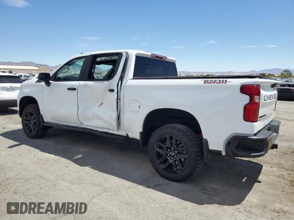 2024 Chevrolet Silverado 1500 Custom Trail Boss z VIN 3GCUDCE87RG454311, wystawiony jako Copart lot #66486955 z przebiegiem 3 402 mil mil oraz Szkoda całkowita • Salvage title. Historia ofert i sprzedaży dostępna na DreamBid. Obrazek 2.